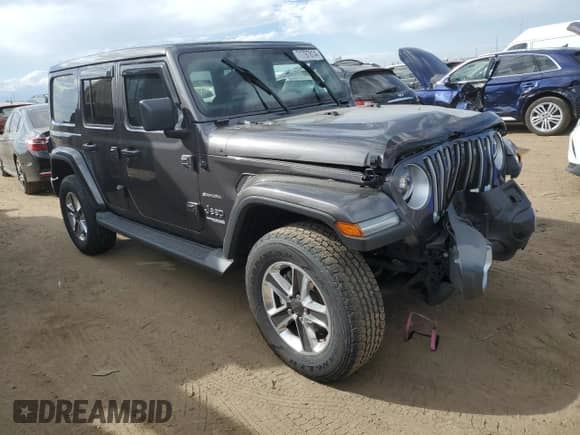 2021 Jeep Wrangler Unlimited Sahara High Altitude with VIN 1C4HJXEM5MW599937, listed as a Copart auction lot 71797814 with Not provided miles and Salvage title. Bid and sale history available at DreamBid. Image 4.