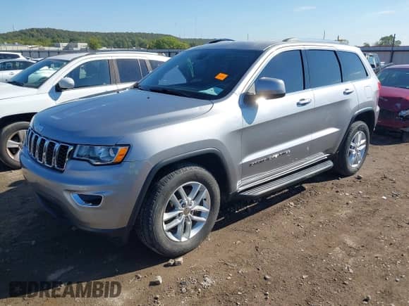 2017 Jeep Grand Cherokee Altitude with VIN 1C4RJFAG1HC683842, listed as a IAAI auction lot 43242272 with 149,432 mi miles and . Bid and sale history available at DreamBid. Image 2.