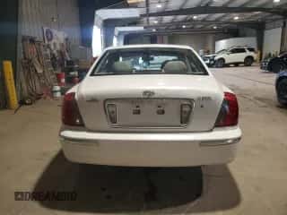 2005 Hyundai XG с VIN KMHFU45E45A386591, выставлен на аукционе Copart как лот 55950715 с пробегом 64 291 миль миль и Списание • Salvage title. История ставок и продаж доступна на DreamBid. Изображение 6.