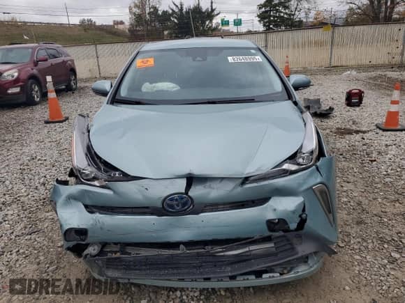2021 Toyota Prius XLE with VIN JTDL9MFU0M3031094, listed as a Copart auction lot 82648995 with 50,455 mi miles and Salvage title. Bid and sale history available at DreamBid. Image 5.