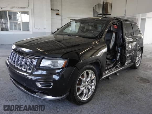 2014 Jeep Grand Cherokee Summit with VIN 1C4RJFJG5EC340768, listed as a Copart auction lot 76582324 with 119,377 mi miles and Salvage title. Bid and sale history available at DreamBid. Image 2.