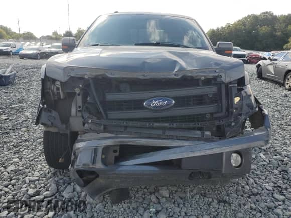 2013 Ford F-150 Lariat with VIN 1FTFW1ET6DFA23450, listed as a Copart auction lot 71629705 with 213,830 mi miles and Salvage title. Bid and sale history available at DreamBid. Image 5.