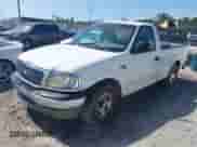 1999 Ford F-150 z VIN 1FTRF17W4XNA83483, wystawiony jako IAAI lot #43337226 z przebiegiem Nie podano mil oraz . Historia ofert i sprzedaży dostępna na DreamBid. Obrazek 2.