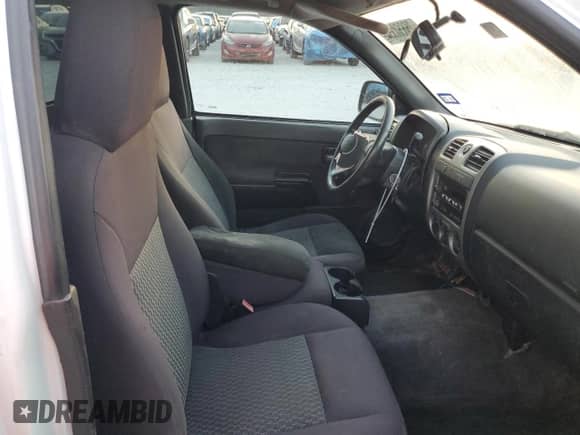 2012 Chevrolet Colorado Work Truck z VIN 1GCCSBFEXC8168336, wystawiony jako Copart lot #75650354 z przebiegiem 99 087 mil mil oraz Szkoda całkowita • Salvage title. Historia ofert i sprzedaży dostępna na DreamBid. Obrazek 10.