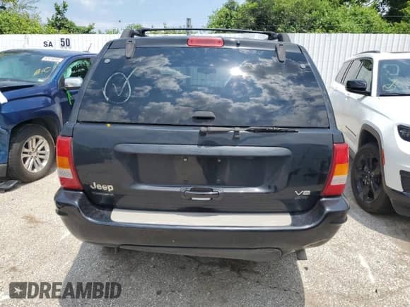 2004 Jeep Grand Cherokee Overland с VIN 1J8GW68J54C217103, выставлен на аукционе Copart как лот 62670434 с пробегом Не указан миль и Списание • Salvage title. История ставок и продаж доступна на DreamBid. Изображение 6.