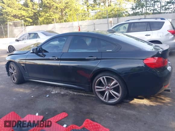 2015 BMW 4 Series 435i with VIN WBA4B1C55FD418299, listed as a IAAI auction lot 42794656 with 69,554 mi miles and . Bid and sale history available at DreamBid. Image 15.