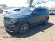 2017 Jeep Grand Cherokee SRT z VIN 1C4RJFDJ5HC688694, wystawiony jako IAAI lot #42134459 z przebiegiem 89 988 mil mil oraz . Historia ofert i sprzedaży dostępna na DreamBid. Obrazek 19.