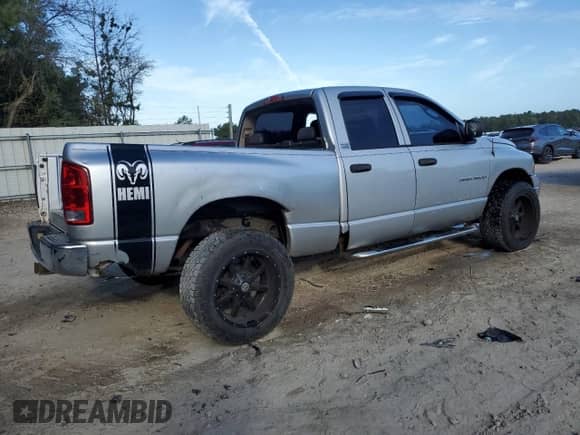2004 Dodge 1500 SLT with VIN 1D7HU18D84S671369, listed as a Copart auction lot 84561975 with 212,752 mi miles and Salvage title. Bid and sale history available at DreamBid. Image 3.