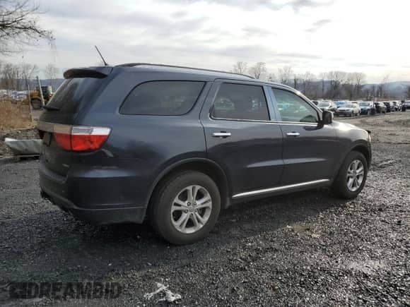 2013 Dodge Durango Crew with VIN 1C4SDHDT9DC661532, listed as a Copart auction lot 52722005 with 23,095 mi miles and Salvage title. Bid and sale history available at DreamBid. Image 3.