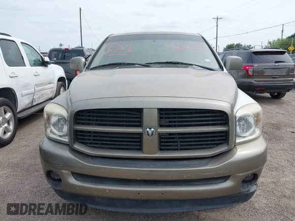 2007 Dodge 1500 SLT z VIN 1D7HA16P27J567637, wystawiony jako IAAI lot #42122423 z przebiegiem 230 111 mil mil oraz . Historia ofert i sprzedaży dostępna na DreamBid. Obrazek 6.