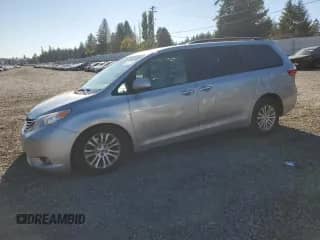 2015 Toyota Sienna XLE with VIN 5TDYK3DC2FS689354, listed as a Copart auction lot 82522205 with 101,074 mi miles and Salvage title. Bid and sale history available at DreamBid. Image 1.