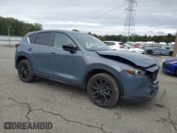 2024 Mazda CX-5 S Carbon Edition z VIN JM3KFBCL7R0521388, wystawiony jako Copart lot #84394325 z przebiegiem 17 806 mil mil oraz Szkoda całkowita • Salvage title. Historia ofert i sprzedaży dostępna na DreamBid. Obrazek 4.