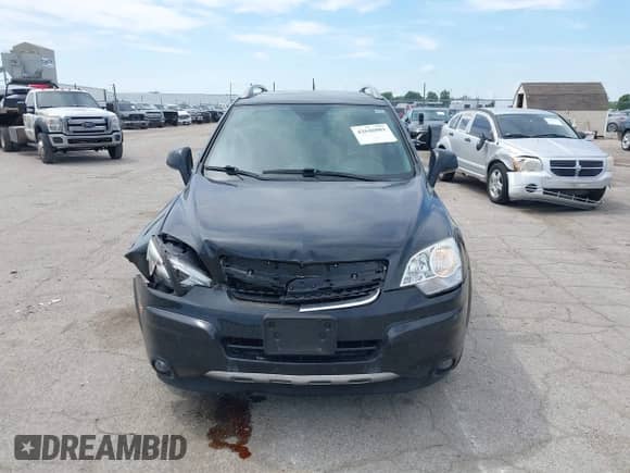 2014 Chevrolet Captiva Sport LTZ z VIN 3GNAL4EK2ES630641, wystawiony jako IAAI lot #42646081 z przebiegiem 154 830 mil mil oraz . Historia ofert i sprzedaży dostępna na DreamBid. Obrazek 12.
