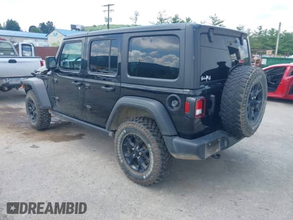 2021 Jeep Wrangler Unlimited Willys with VIN 1C4HJXDN7MW504854, listed as a IAAI auction lot 42605357 with 74,092 mi miles and . Bid and sale history available at DreamBid. Image 3.
