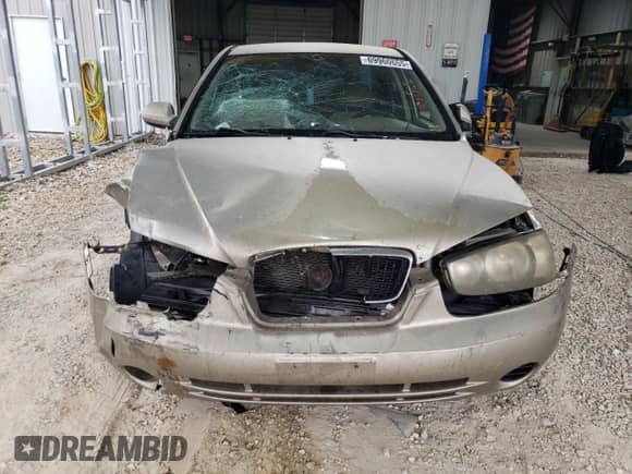 2003 Hyundai Elantra GLS с VIN KMHDN45D63U597301, выставлен на аукционе Copart как лот 69960655 с пробегом Не указан миль и Списание • Salvage title. История ставок и продаж доступна на DreamBid. Изображение 5.