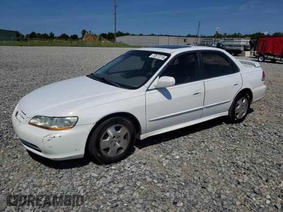 2001 Honda Accord EX z VIN 1HGCG16561A061805, wystawiony jako Copart lot #70577215 z przebiegiem 233 090 mil mil oraz Szkoda całkowita • Salvage title. Historia ofert i sprzedaży dostępna na DreamBid. Obrazek 1.