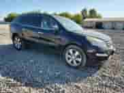 2016 Chevrolet Traverse LTZ z VIN 1GNKVJKDXGJ105608, wystawiony jako Copart lot #80371815 z przebiegiem 143 454 mil mil oraz Szkoda całkowita • Salvage title. Historia ofert i sprzedaży dostępna na DreamBid. Obrazek 4.