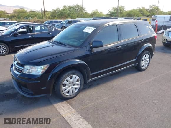 2014 Dodge Journey American Value with VIN 3C4PDCAB8ET284136, listed as a IAAI auction lot 43166528 with 120,317 mi miles and . Bid and sale history available at DreamBid. Image 2.