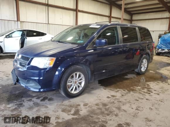 2014 Dodge Grand Caravan SXT 30th Anniversary with VIN 2C4RDGCG5ER290133, listed as a Copart auction lot 63633255 with 132,598 mi miles and Salvage title. Bid and sale history available at DreamBid. Image 1.