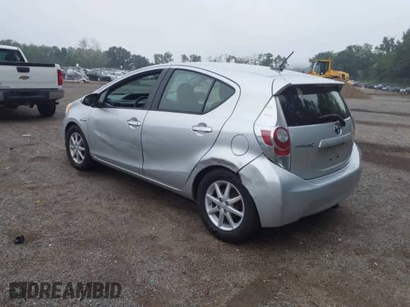 2013 Toyota Prius One z VIN JTDKDTB3XD1051060, wystawiony jako IAAI lot #42851670 z przebiegiem 163 017 mil mil oraz . Historia ofert i sprzedaży dostępna na DreamBid. Obrazek 3.