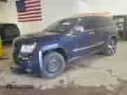 2012 Jeep Grand Cherokee Overland with VIN 1C4RJFCT4CC160396, listed as a Copart auction lot 71516165 with 135,574 mi miles and Salvage title. Bid and sale history available at DreamBid. Image 1.