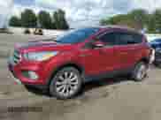 2017 Ford Escape Titanium with VIN 1FMCU9JD4HUD09865, listed as a Copart auction lot 68383735 with 136,198 mi miles and Clean title. Bid and sale history available at DreamBid. Image 1.