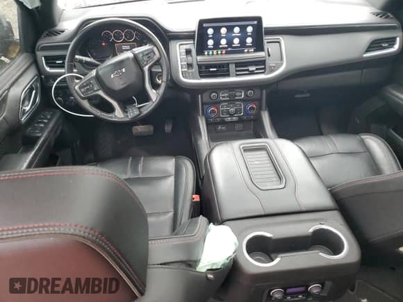2021 Chevrolet Suburban RST с VIN 1GNSKEKD4MR210450, выставлен на аукционе Copart как лот 84372054 с пробегом 98 560 миль миль и Списание • Salvage title. История ставок и продаж доступна на DreamBid. Изображение 8.