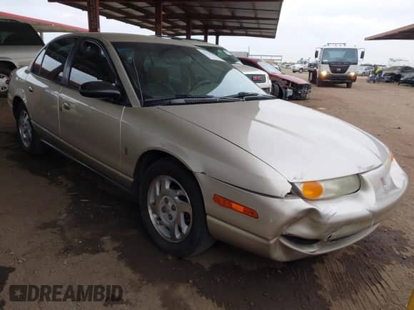 2001 Saturn SL with VIN 1G8ZJ54771Z315992, listed as a IAAI auction lot 41571554 with 262,240 mi miles and . Bid and sale history available at DreamBid. Image 1.