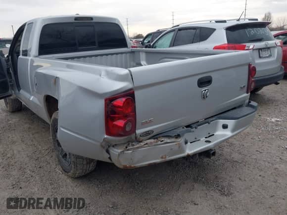 2007 Dodge Dakota SLT with VIN 1D7HW42P27S129431, listed as a IAAI auction lot 41673222 with 134,215 mi miles and . Bid and sale history available at DreamBid. Image 6.