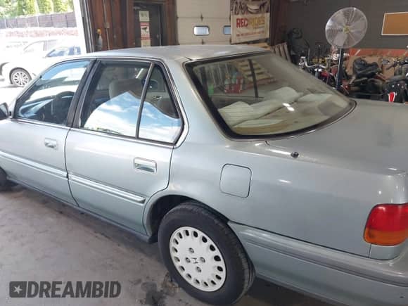1992 Honda Accord LX with VIN JHMCB7658NC016387, listed as a IAAI auction lot 42682778 with 113,566 mi miles and . Bid and sale history available at DreamBid. Image 14.