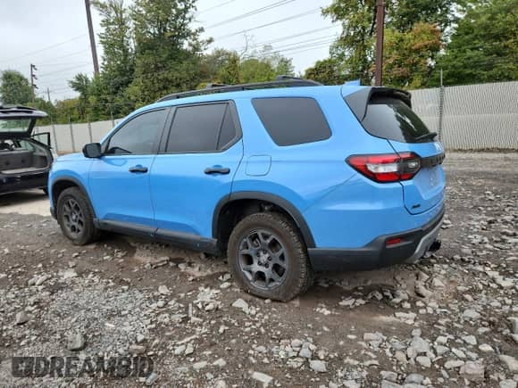 2024 Honda Pilot TrailSport с VIN 5FNYG1H69RB023496, выставлен на аукционе Copart как лот 82095495 с пробегом 29 632 миль миль и Списание • Salvage title. История ставок и продаж доступна на DreamBid. Изображение 2.