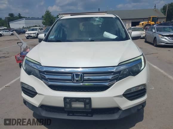 2017 Honda Pilot EX-L with VIN 5FNYF6H77HB017722, listed as a IAAI auction lot 42800151 with 94,457 mi miles and . Bid and sale history available at DreamBid. Image 12.