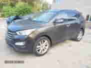 2014 Hyundai Santa Fe with VIN 5XYZUDLA5EG181900, listed as a IAAI auction lot 43133128 with 223,945 mi miles and . Bid and sale history available at DreamBid. Image 2.