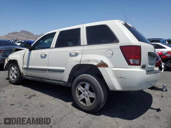 2008 Jeep Grand Cherokee Laredo с VIN 1J8GS48K38C121436, выставлен на аукционе Copart как лот 60831235 с пробегом 205 854 миль миль и Списание • Salvage title. История ставок и продаж доступна на DreamBid. Изображение 2.
