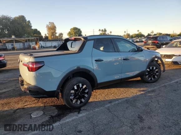 2025 Hyundai Santa Cruz SEL Activity z VIN 5NTJCDDE8SH149546, wystawiony jako Copart lot #90921035 z przebiegiem 396 mil mil oraz Szkoda całkowita • Salvage title. Historia ofert i sprzedaży dostępna na DreamBid. Obrazek 3.