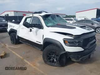 2021 Ram 1500 TRX with VIN 1C6SRFU95MN904579, listed as a IAAI auction lot 42354576 with 76,897 mi miles and . Bid and sale history available at DreamBid. Image 1.