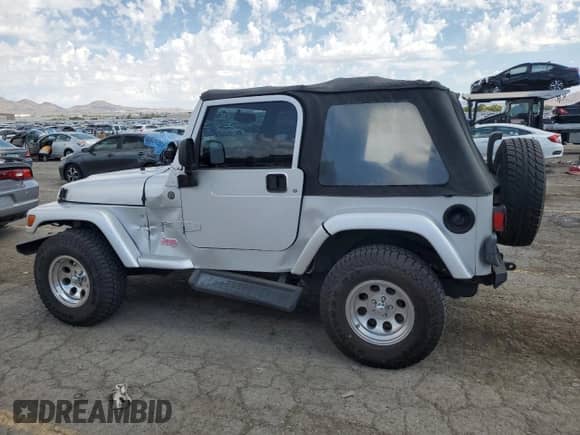 2004 Jeep Wrangler X z VIN 1J4FA39S04P739230, wystawiony jako Copart lot #84052405 z przebiegiem 97 855 mil mil oraz Szkoda całkowita • Salvage title. Historia ofert i sprzedaży dostępna na DreamBid. Obrazek 2.