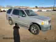 2005 Ford Explorer XLS with VIN 1FMZU72KX5ZA62569, listed as a Copart auction lot 86508204 with 116,241 mi miles and Salvage title. Bid and sale history available at DreamBid. Image 4.