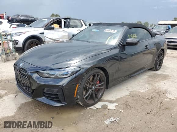 2022 BMW 4 Series M440i with VIN WBA53AT06NCK11740, listed as a Copart auction lot 63387673 with 10,184 mi miles and . Bid and sale history available at DreamBid. Image 1.