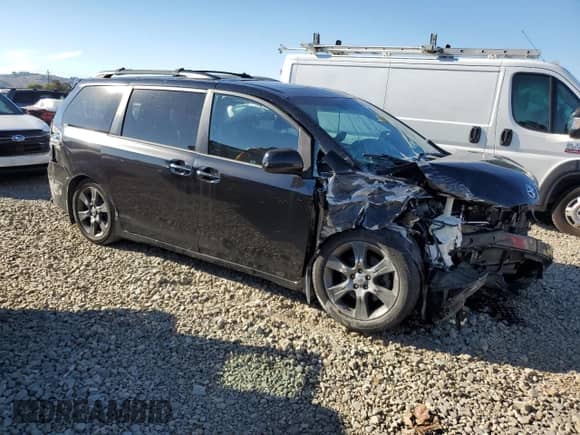 2015 Toyota Sienna SE Premium with VIN 5TDXK3DC2FS596961, listed as a Copart auction lot 89636705 with 107,881 mi miles and Salvage title. Bid and sale history available at DreamBid. Image 4.