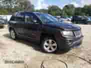 2014 Jeep Compass Latitude with VIN 1C4NJCEA4ED643134, listed as a Copart auction lot 71044335 with 103,025 mi miles and Salvage title. Bid and sale history available at DreamBid. Image 4.