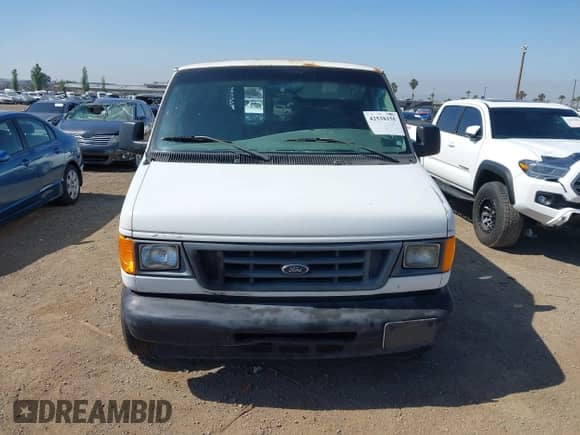 2006 Ford Econoline Cargo with VIN 1FTRE14W56HA74084, listed as a IAAI auction lot 42538155 with 319,655 mi miles and . Bid and sale history available at DreamBid. Image 12.