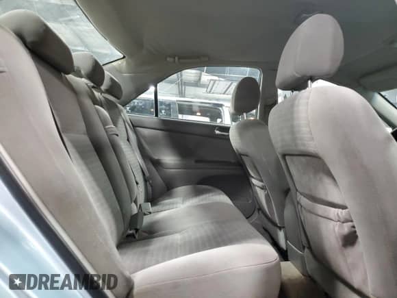 2005 Toyota Camry LE с VIN 4T1BE32K85U983113, выставлен на аукционе Copart как лот 72071865 с пробегом 212 359 миль миль и Списание • Salvage title. История ставок и продаж доступна на DreamBid. Изображение 10.