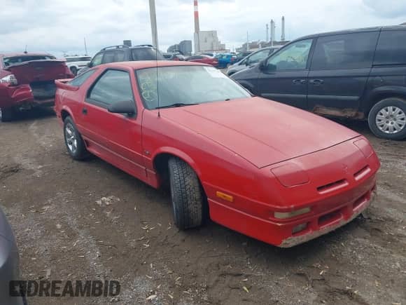 1990 Dodge Daytona with VIN 1B3XG4434LG409069, listed as a IAAI auction lot 42147349 with 111,998 mi miles and . Bid and sale history available at DreamBid. Image 1.