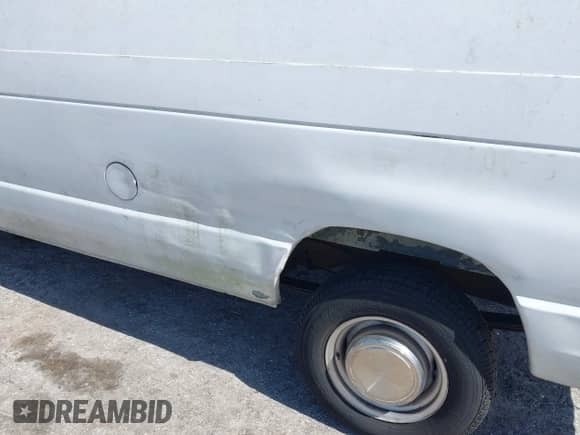1996 Ford Econoline Cargo with VIN 1FTFE24Y9THB01647, listed as a IAAI auction lot 42990641 with 312,069 mi miles and . Bid and sale history available at DreamBid. Image 6.