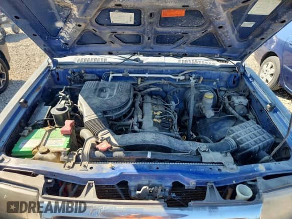 1998 Nissan Frontier with VIN 1N6DD21Y8WC313047, listed as a Copart auction lot 85376735 with Not provided miles and Clean title. Bid and sale history available at DreamBid. Image 11.