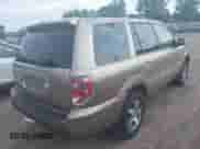 2006 Honda Pilot EX-L z VIN 5FNYF18616B013818, wystawiony jako IAAI lot #42967753 z przebiegiem 160 408 mil mil oraz . Historia ofert i sprzedaży dostępna na DreamBid. Obrazek 4.