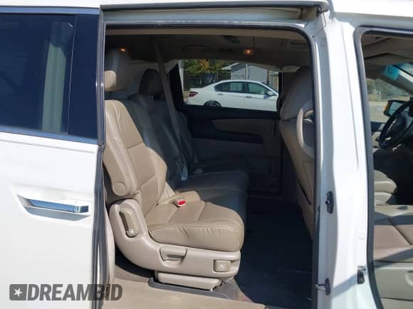 2012 Honda Odyssey Touring with VIN 5FNRL5H9XCB145597, listed as a IAAI auction lot 43247934 with 257,447 mi miles and . Bid and sale history available at DreamBid. Image 8.