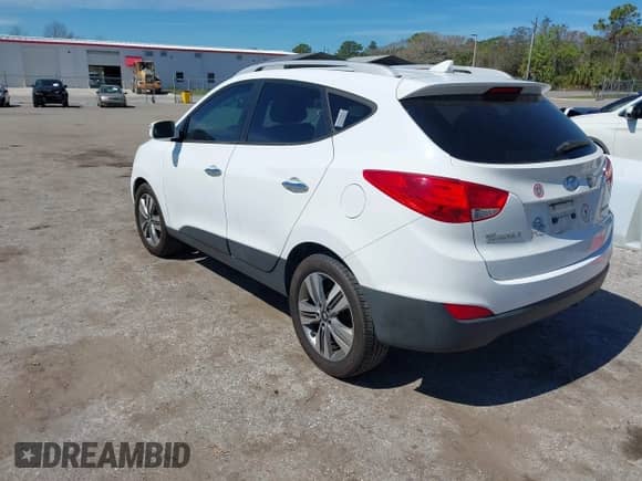 2014 Hyundai Tucson SE with VIN KM8JU3AG8EU829819, listed as a IAAI auction lot 41702183 with 90,791 mi miles and . Bid and sale history available at DreamBid. Image 3.