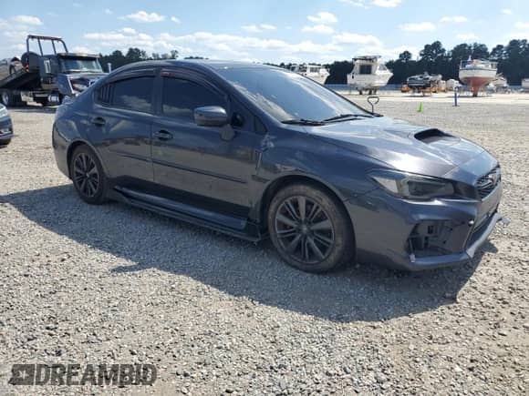 2018 Subaru WRX с VIN JF1VA1A61J9803253, выставлен на аукционе Copart как лот 70902075 с пробегом 77 789 миль миль и Списание • Salvage title. История ставок и продаж доступна на DreamBid. Изображение 4.